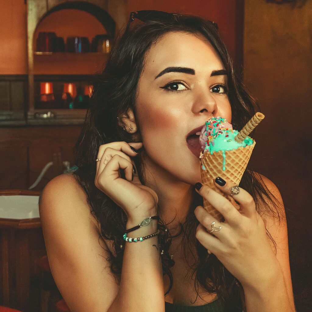 beautiful girl eating icecream