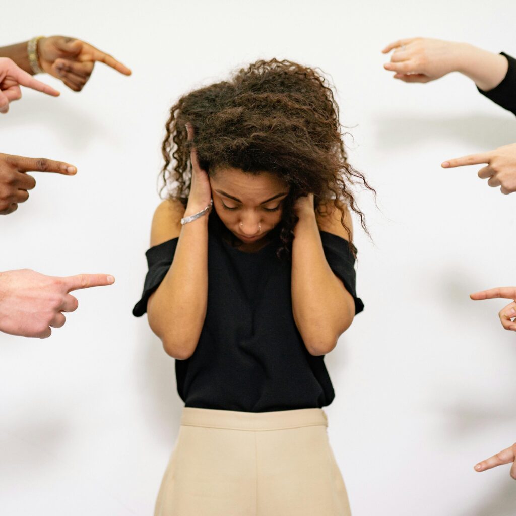 pexels fingers pointing to woman in shame